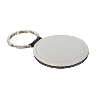 Llavero redondo de PU blanco para sublimación. Reverso capa PU negro con brillo (no sublimable). Argolla de Acero inoxidable.